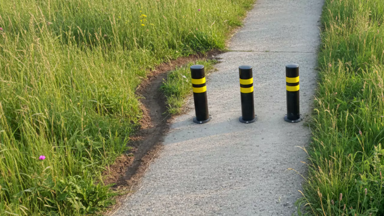 desire path formed by people avoiding a bollard